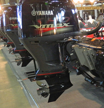 Large outboard motors lined up at 2014 Tulsa Boat Show.