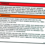 Propeller warning along with four other warnings on same label at 2013 Tulsa Boat Show.