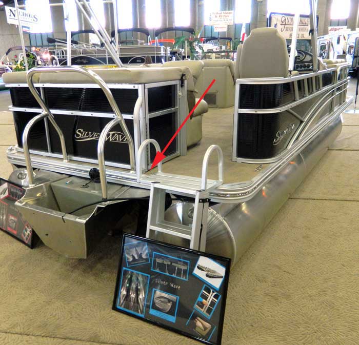 Placement of propeller warning decal on pontoon boat at 2013 Tulsa Boat Show viewed from a distance.
