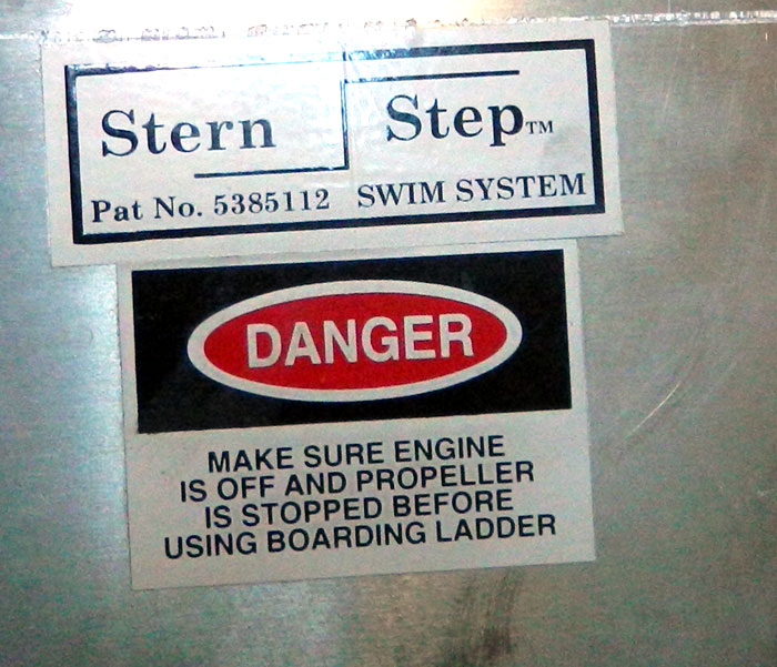 Propeller warning on pontoon boat at 2013 Tulsa Boat Show along with TM & Patent Label