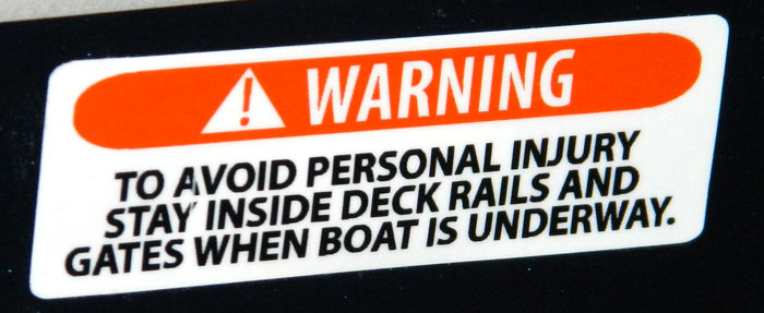 Deck Rails warning, flat label. 2014 Tulsa Boat Show.