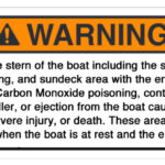 Altered version of the Nautique warning, this one is rectangular.